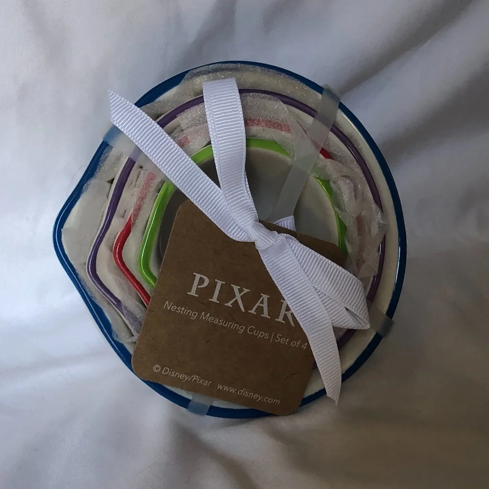 NWT Rae Dunn Disney Toy Story Set of 4 Measuring Cups Woody Buzz Lightyear Alien